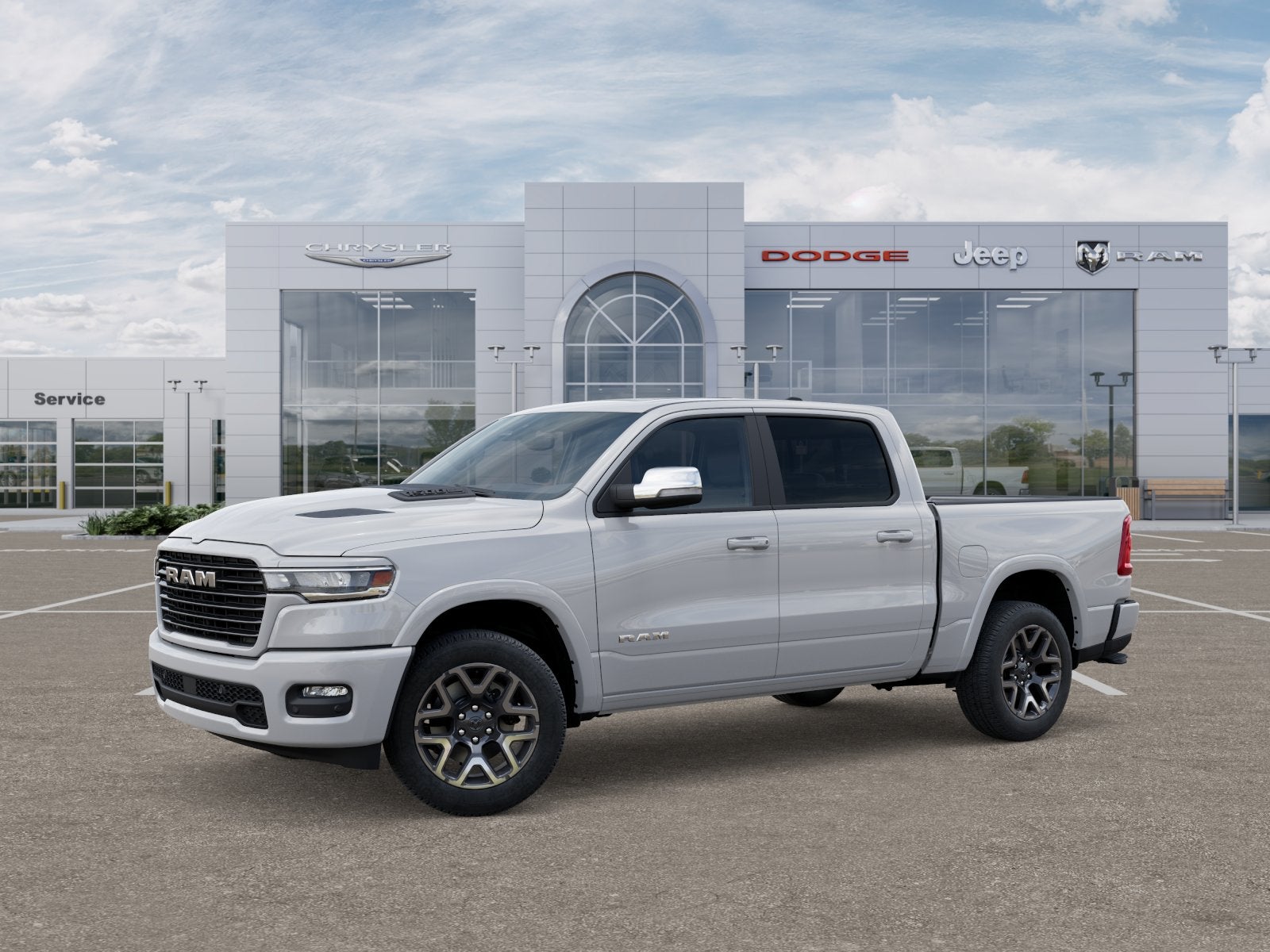 2025 RAM Ram 1500 RAM 1500 LARAMIE CREW CAB 4X4 5'7' BOX in Bright White Clear-Coat Exterior Paint — front three-quarter view