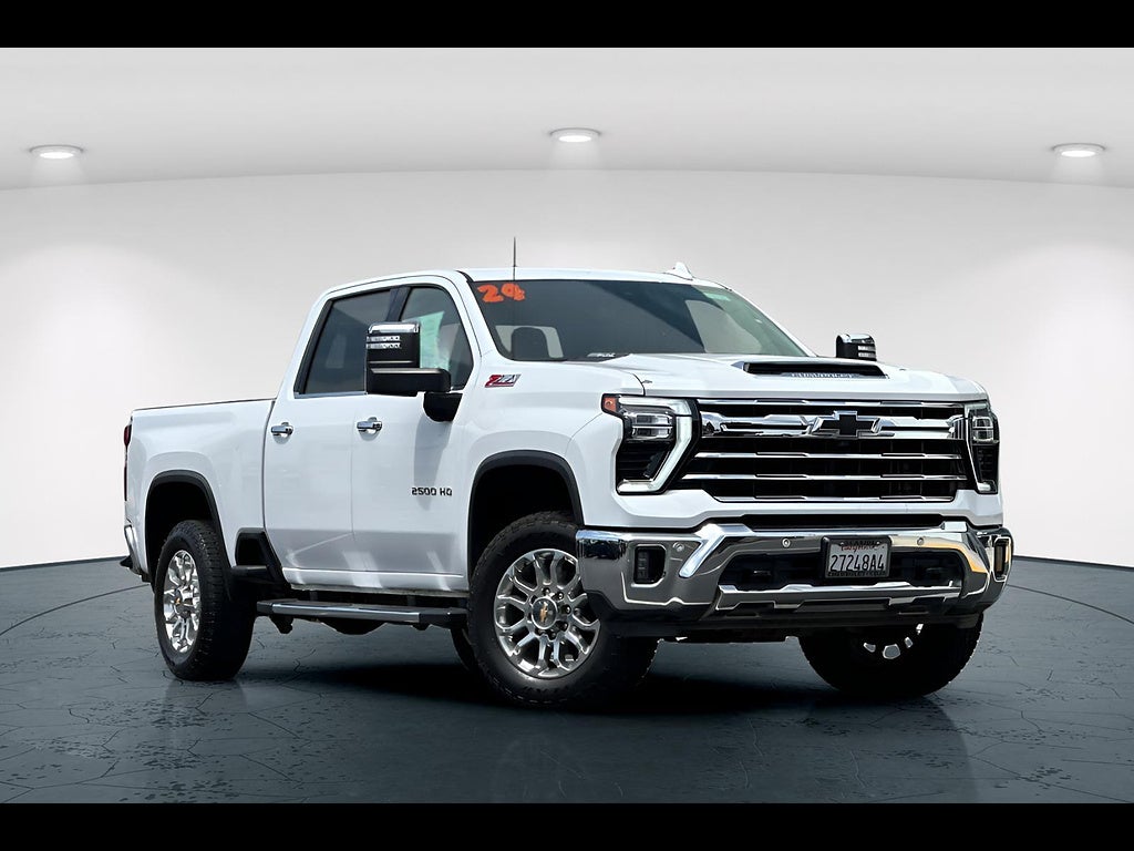 2024 Chevrolet Silverado 2500HD 4WD Crew Cab Standard Bed LTZ in Summit White — front three-quarter view
