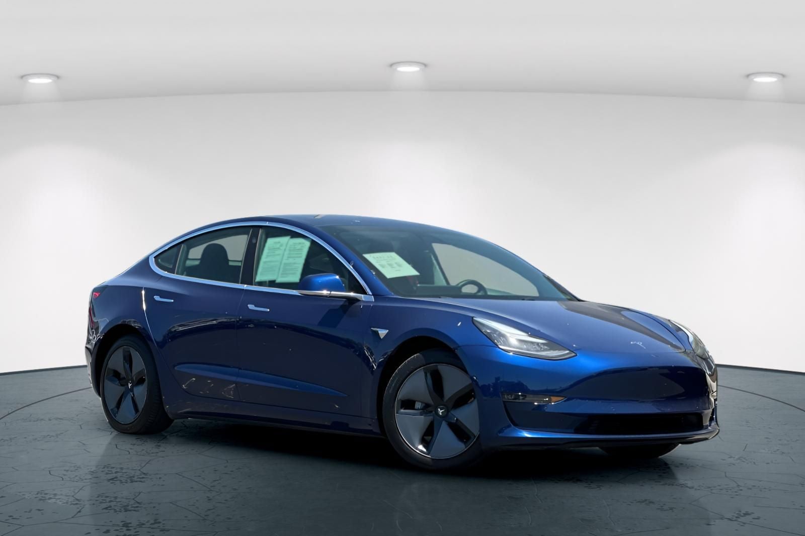 2019 Tesla Model 3 Long Range in Deep Blue Metallic — front three-quarter view